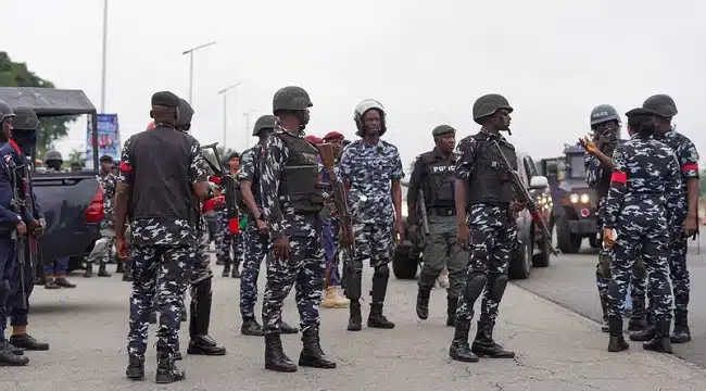 Dele Farotimi: Armed Police Officers Take Over Afe Babalola’s Firm in Lagos Amid Protests**  